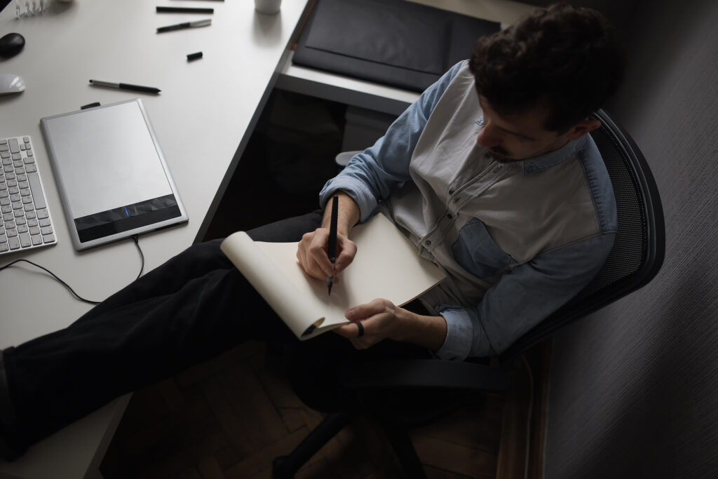 Professional ghostwriter developing a book manuscript for an author